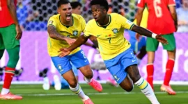 Brasil Menang Telak 3-0 atas Skotlandia, Vinicius Jr Cetak 2 Gol dan Jadi Bintang. (Foto: AFP/JEWEL SAMAD/kompas)