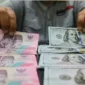 Rupiah Kembali Merosot Hari Ini, Dolar AS Sentuh Rp17.947. (Foto: Investor Daily/David Gita Roza)