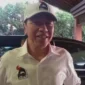 Jokowi Kenakan Kemeja dan Topi PSI Saat Berangkat ke Lampung. (Foto: CNN Indonesia/ Rosyid)