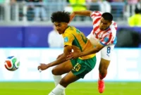 Hasil Paraguay vs Australia Piala Dunia 2026: Skor 0-0 Cukup Bawa Australia ke Babak 32 Besar. (Foto: REUTERS/Carlos Barria/cnnindonesia)