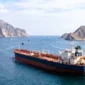 Iran Siapkan Aturan Baru, Kapal yang Melintas di Selat Hormuz Akan Dikenakan Biaya. (Foto: Google Gemini/suara)